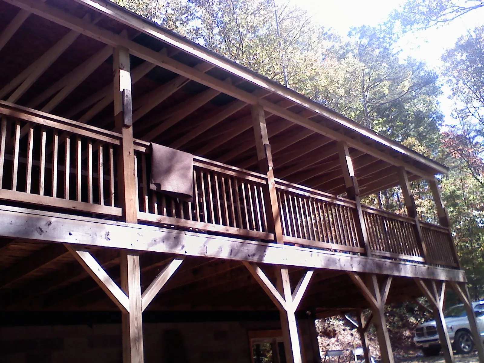 Timber framing under a new elevated porch and deck — Roof Leak Repair in Bokeelia by Roofing Brothers